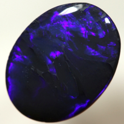 SOLID BLACK OPAL Elegant Blue on Black. Royal blue rolling flashes SEE VIDEO